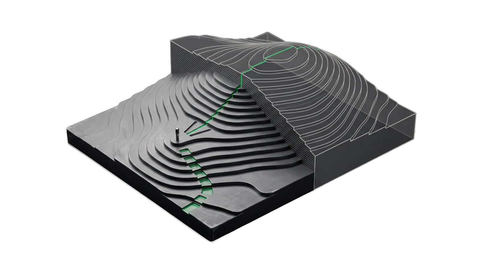 A machined contour relief of a hill with four polished green steps climbing toward the summit and three probe grooves fanning from the last one, the upper hill cut away into bone-grey outline.